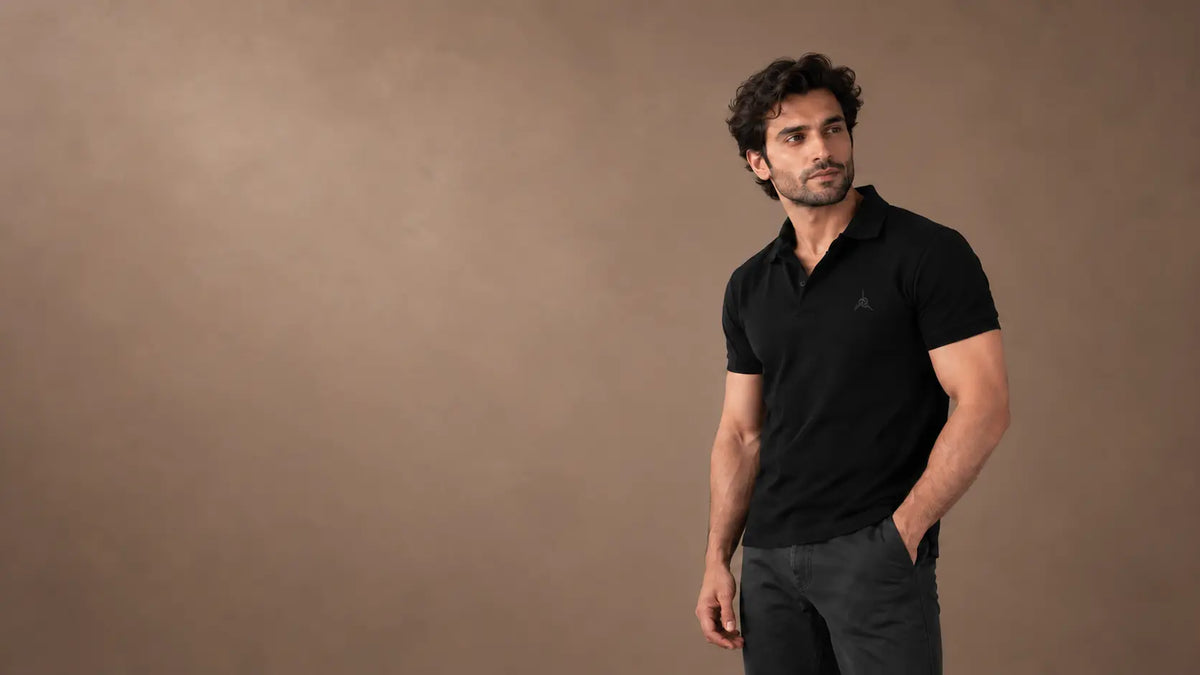 Model wearing a SUBTTL polo shirt